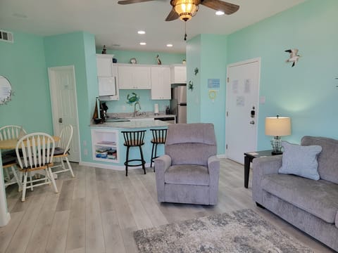 Living room, dining area and kitchen.