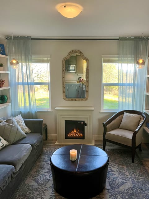 Living room with lovely exterior views.