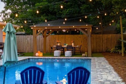 Unwind in your private backyard with a covered lounge and plenty of seating