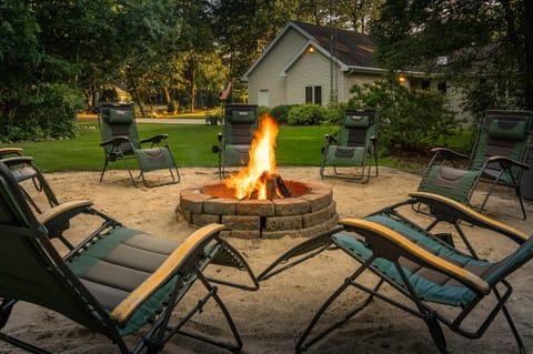 North side view of property.  Outdoor Fire Pit (Hard Wood provided by owner)