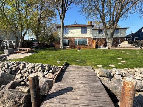 Private backyard, boat dock, boat ramp and beach