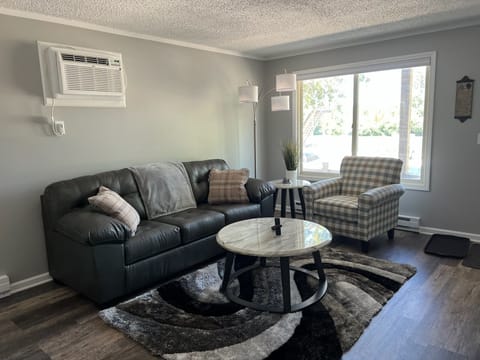 Spacious living room with cozy furniture! 