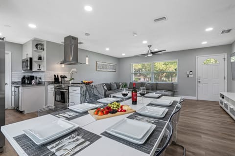 Nothing beats freshly cooked meals shared with loved ones! Enjoy meals with family in this elegant dining table that seats 8 people. Book your stay now!