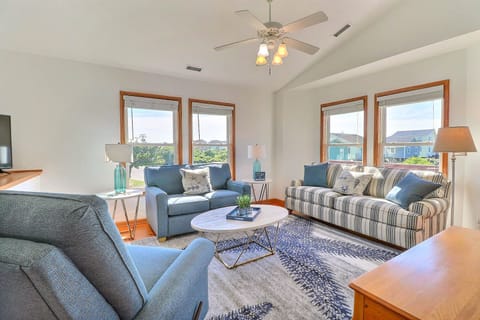 Upstairs, you'll enjoy spending time with the family in the thoughtfully decorated living area with coastal accents!