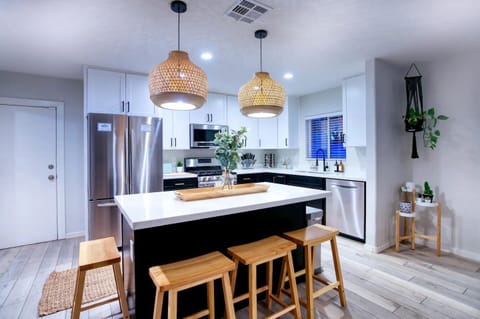 Open concept kitchen with giant island and plenty of seating