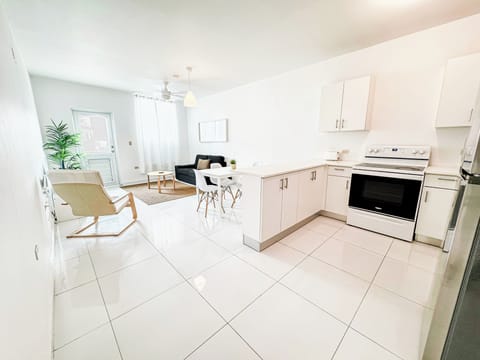 Fridge, microwave, cookware/dishes/utensils