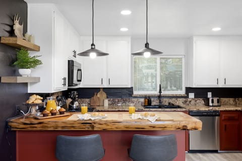 Spacious kitchen with breakfast bar.