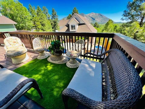 Beautiful deck with lots of furniture to relax on and enjoy the Mountain views!