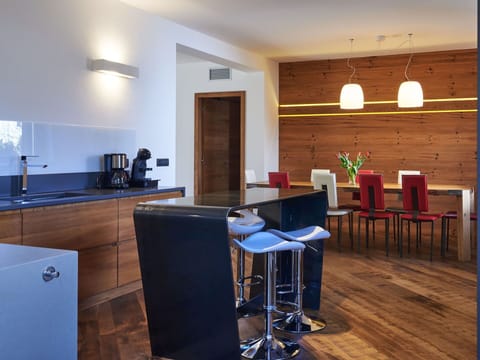 Furniture, Cabinetry, Chair, Wood, Lighting, Interior Design, Kitchen, Architecture, Hall, Flooring