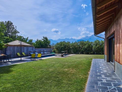 Cloud, Sky, Plant, Building, Azure, Tree, Shade, Land Lot, Grass, Leisure