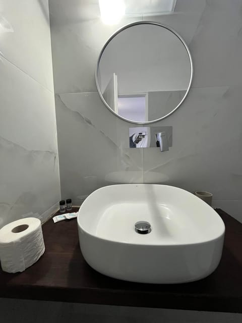 Superior Double Room | Bathroom | Shower, rainfall showerhead, hair dryer, slippers