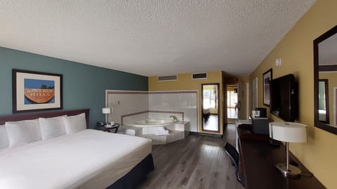 Deluxe Room, 1 King Bed | Desk, blackout drapes, iron/ironing board, free WiFi