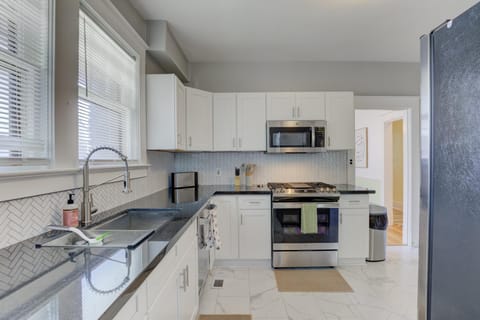 fully stocked kitchen w/ all new stainless steel appliances and espresso machine