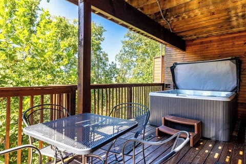Unwind in your private hot tub surrounded by nature’s beauty! Perfect for relaxation.