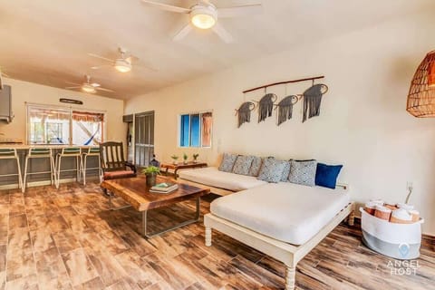 Living area with comfortable seating and an open, airy layout.