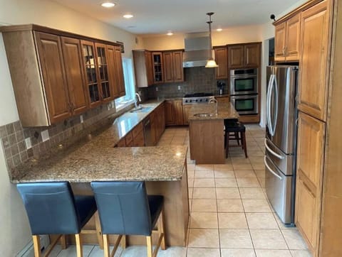 Gourmet kitchen with two sinks, two ovens, ice maker and more!