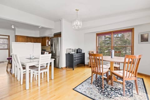 Gorgeous nature views surround the game table with seating for four while the nearby breakfast nook just off the kitchen seats four more and allows for easy serving, snacking and dining.