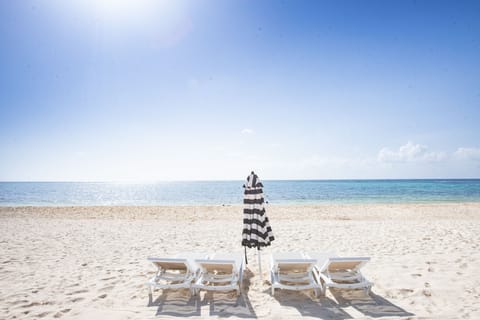 Soft sand, private loungers, and the stunning ocean laid out before you. 