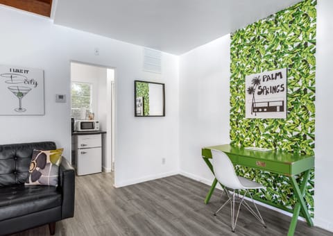 Standard Suite, 1 King Bed | Living area | TV