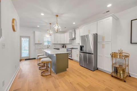 Bright, clean, and functional kitchen featuring stainless steel appliances, ample storage, and all the essentials to make cooking a breeze.