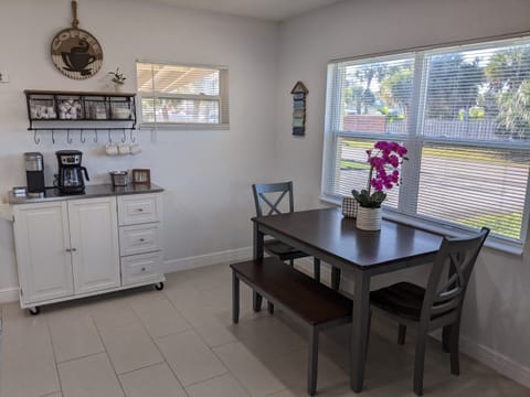 Dining table with seating for up to four.