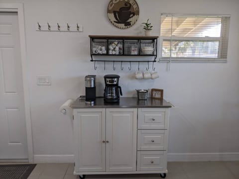 The coffee bar has a Keurig, drip, and French press. 