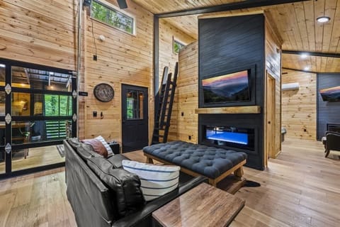 Kitchen vantage point featuring the den and garage door to the porch.