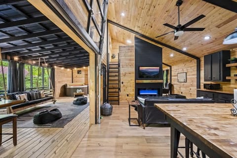 Throw up the glass garage door to open double the size of your living space.