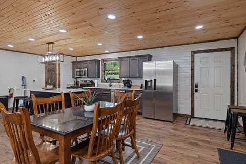 Table for 6 + 6 stools around the island. 