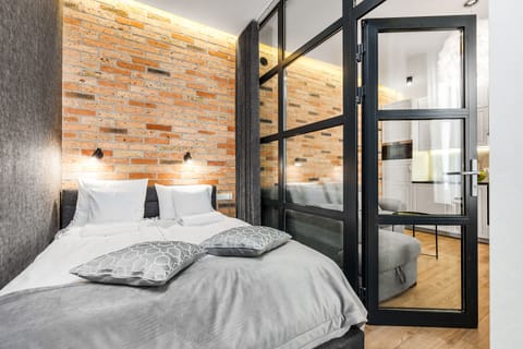 Comfort Apartment | Living area | 42-inch flat-screen TV with cable channels, TV