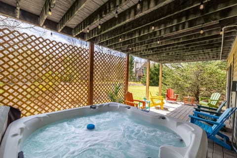 Soak, sip, and unwind in the 6-seater bubbling hot tub—your private hideaway for ultimate mountain relaxation.