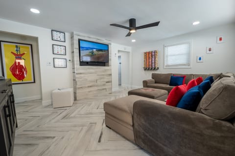 Spacious living room with full size sleeper sectional sofa.