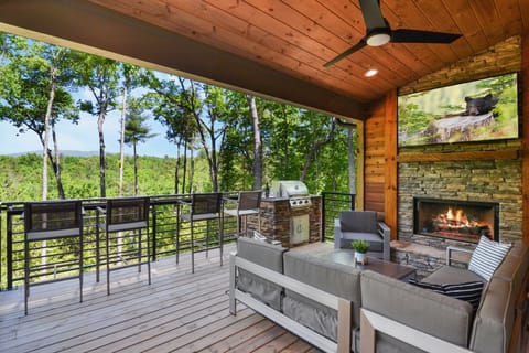 Relax and entertain on the covered deck off the living room.