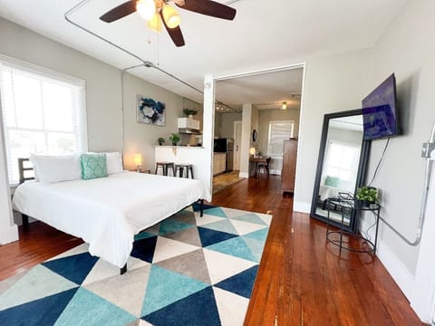 Escape to a roomy bedroom, where you can find solace and enjoy a sense of tranquility.