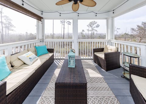 The screened in porch overlooks the bird sanctuary and has great furniture