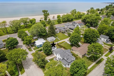 Less than a two minute walk from the driveway to the sand. 