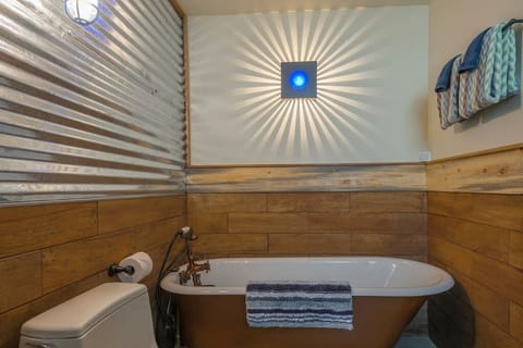 Luxuriously relaxing clawfoot soaking tub in our spa-like bathroom