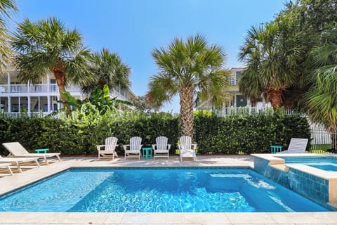 Pool area with hot tub