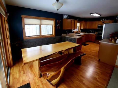 The dining area provides comfortable seating for 6 guests.