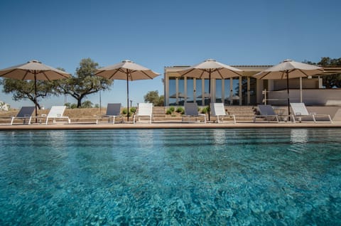 Outdoor pool, open 11:00 AM to 8:00 PM, pool umbrellas, sun loungers