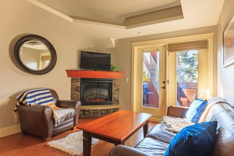 Spacious living room with deck access. Brand new memory foam sofa bed installed - photos coming soon!!