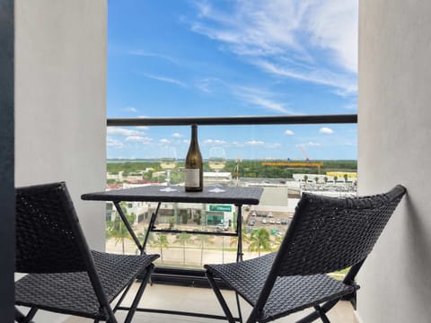Private terrace with outdoor furniture and lagoon view