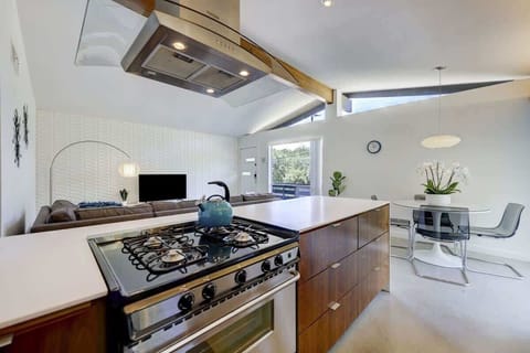 The gleam of stainless steel adds a touch of modern luxury to the kitchen.