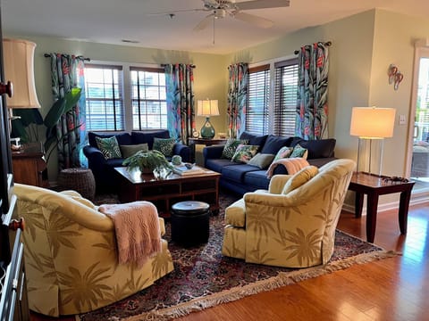 Sitting Area featuring Tommy Bahama furniture, 60" TV, DVD;s and Boardgames