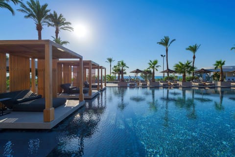 Outdoor pool, pool umbrellas, sun loungers