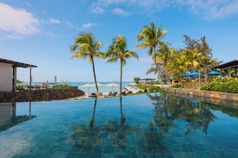 Outdoor pool, pool umbrellas, sun loungers