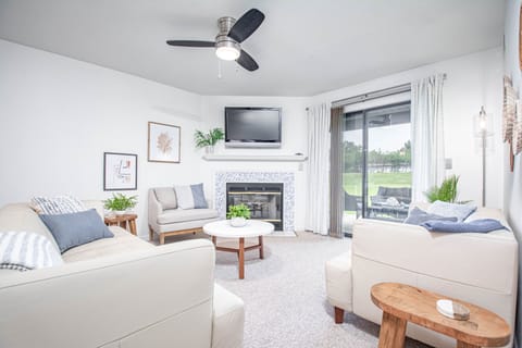 RELAX IN COZY LIVING ROOM AND ENJOY THE FIREPLACE.

