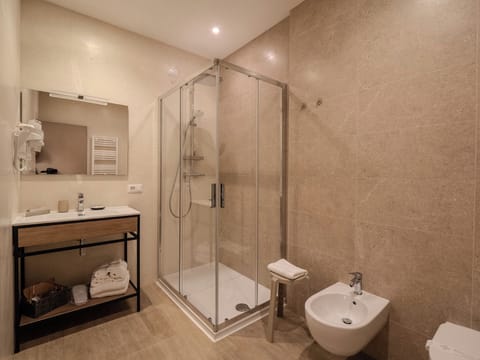 Superior Room | Bathroom | Shower, rainfall showerhead, hair dryer, bidet