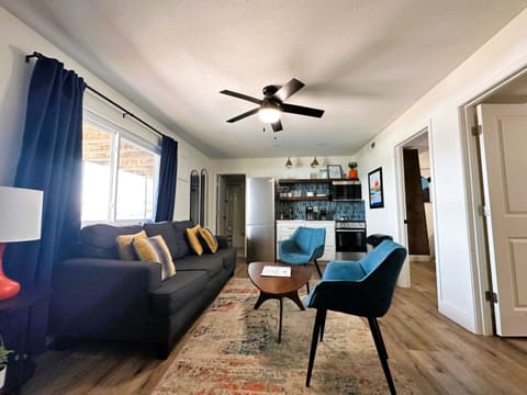 Family Suite | Living area | 45-inch flat-screen TV with cable channels