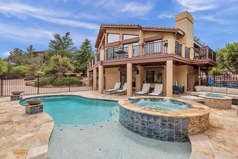 Enjoy the Pool, Hot Tub, Gas Firepit and million dollar views!